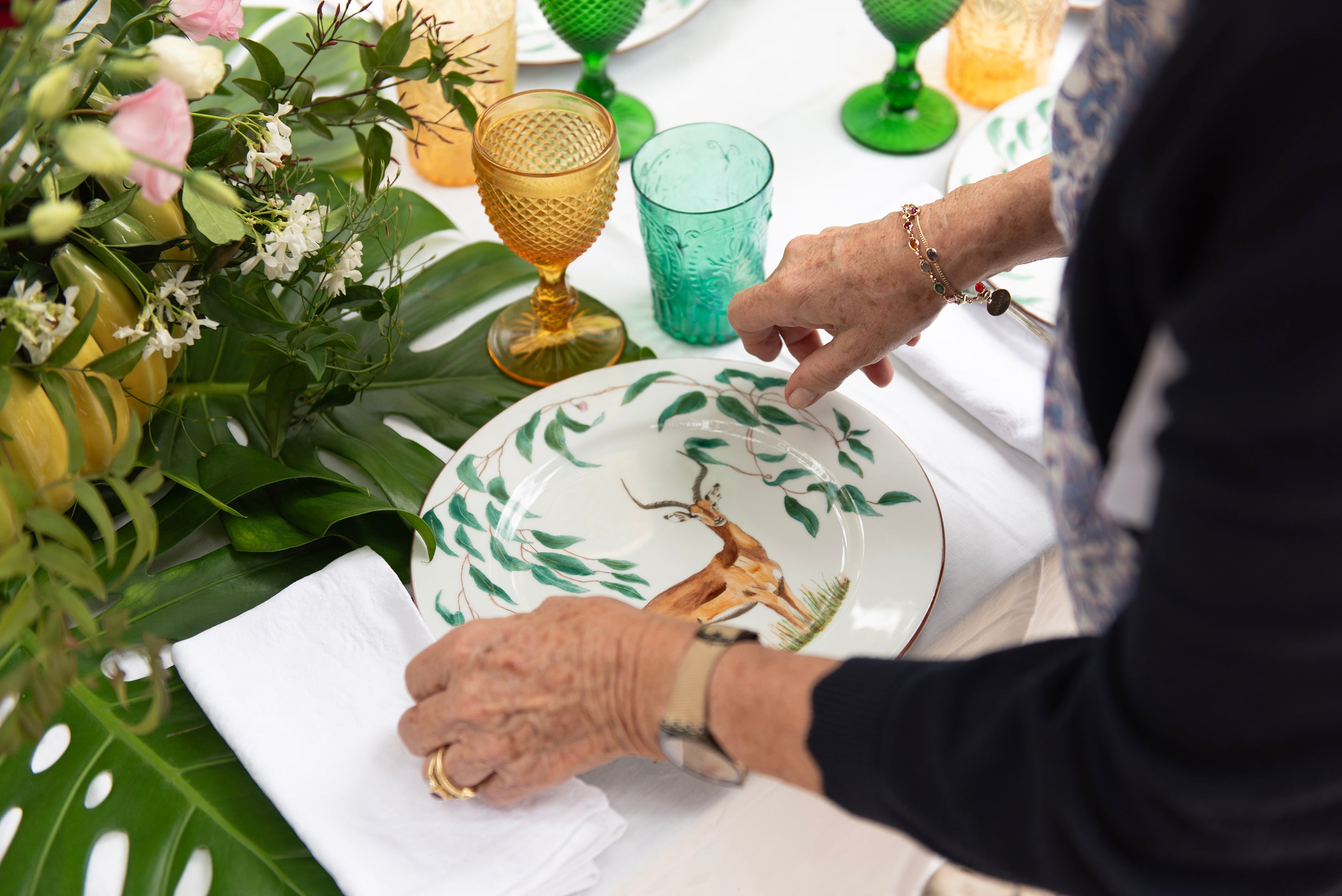 Estelle von Mentzingen, putting the table with her illustrated plates, from the collection "A Taste Of Africa"